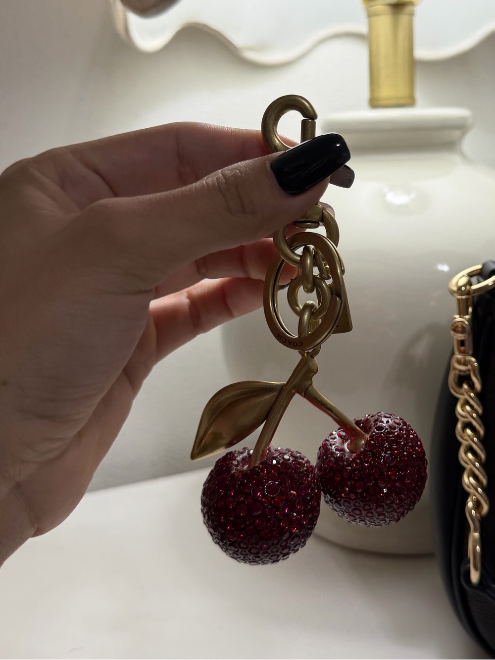 Coach Black Shoulder Bag with Red Cherry Charm